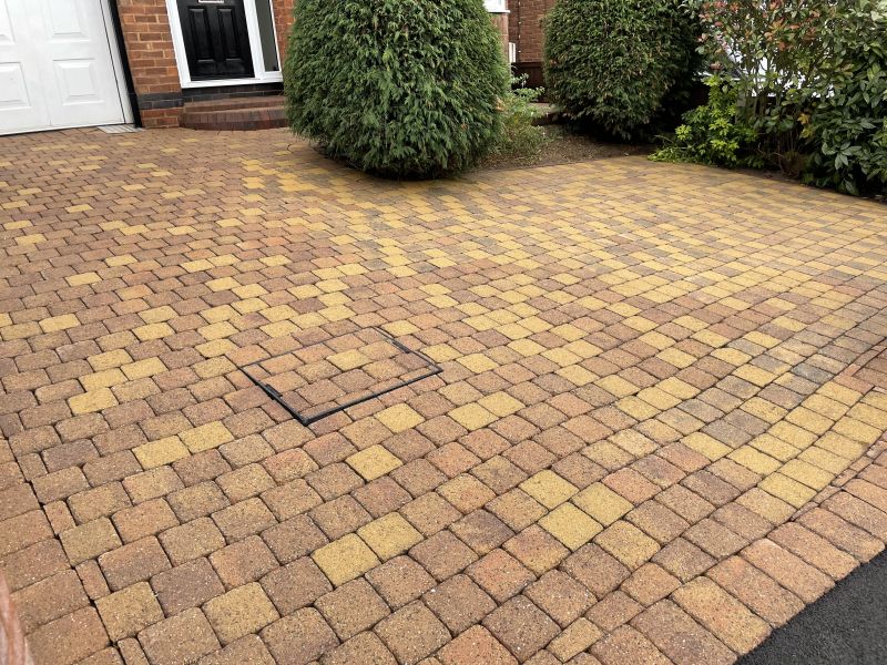 Block paving driveway in Ilkeston after being pressure washed: Swipe To View More Images