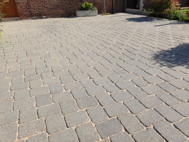 Block paving driveway after being pressure washed and re-sanded in Mackworth: Swipe To View More Images