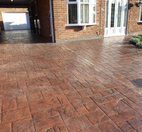 Printed concrete driveway before being cleaned and re-sealed in Ilkeston: Click Here To View Larger Image