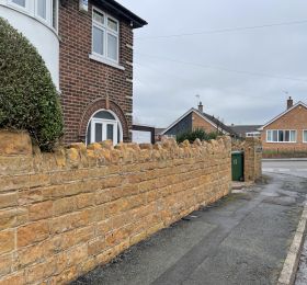Stone wall in Langley mill&comma; Derbyshire after being cleaned : Click Here To View Larger Image